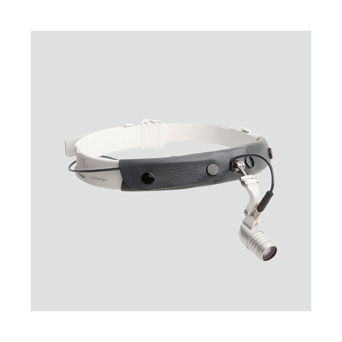 Lampada da esame Heine Microlight 2 montaggio su fascia frontaleLampade Frontali HEINE J-008.31.277